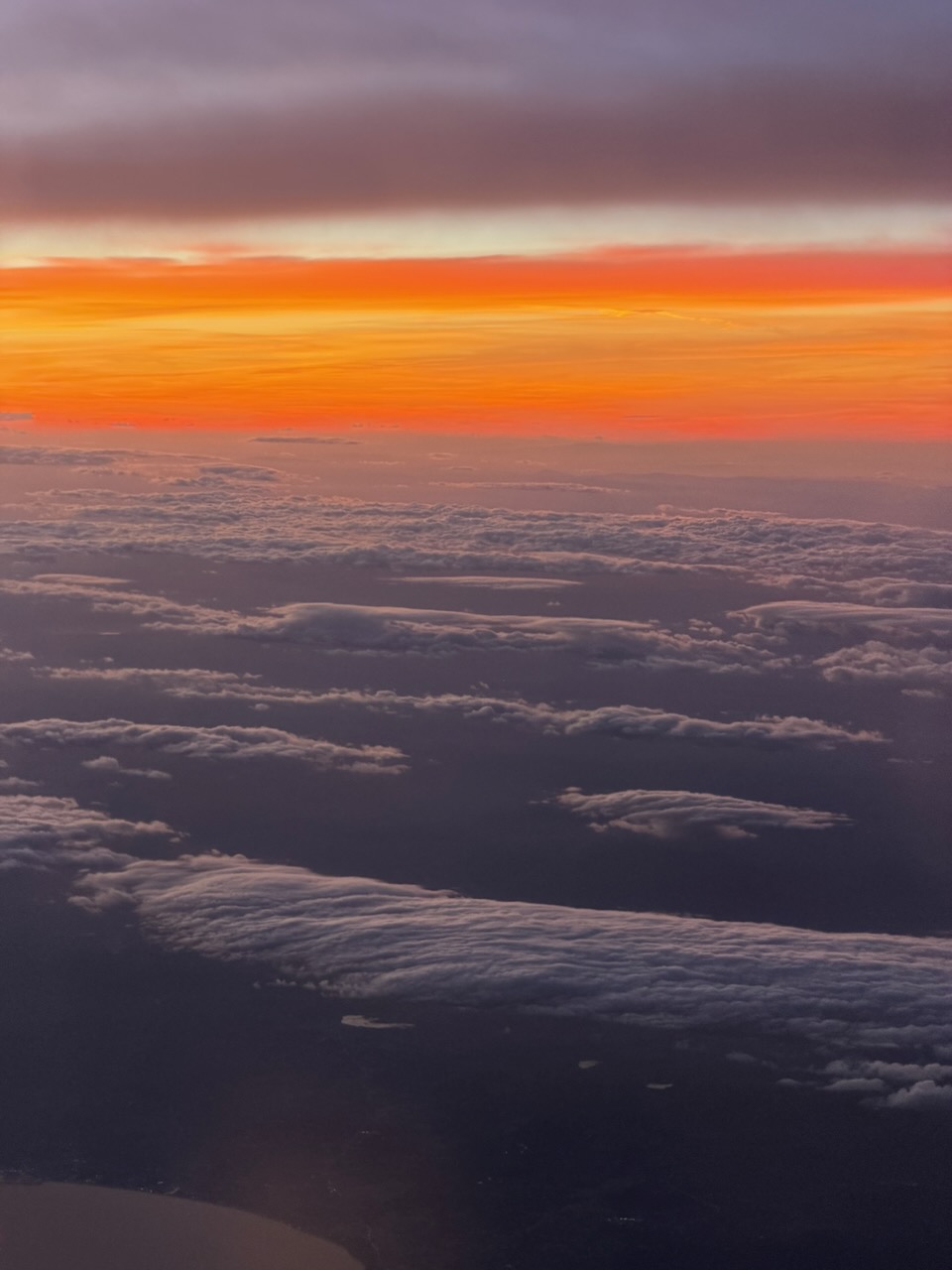 A glowing cloudbank seen from an aeroplane